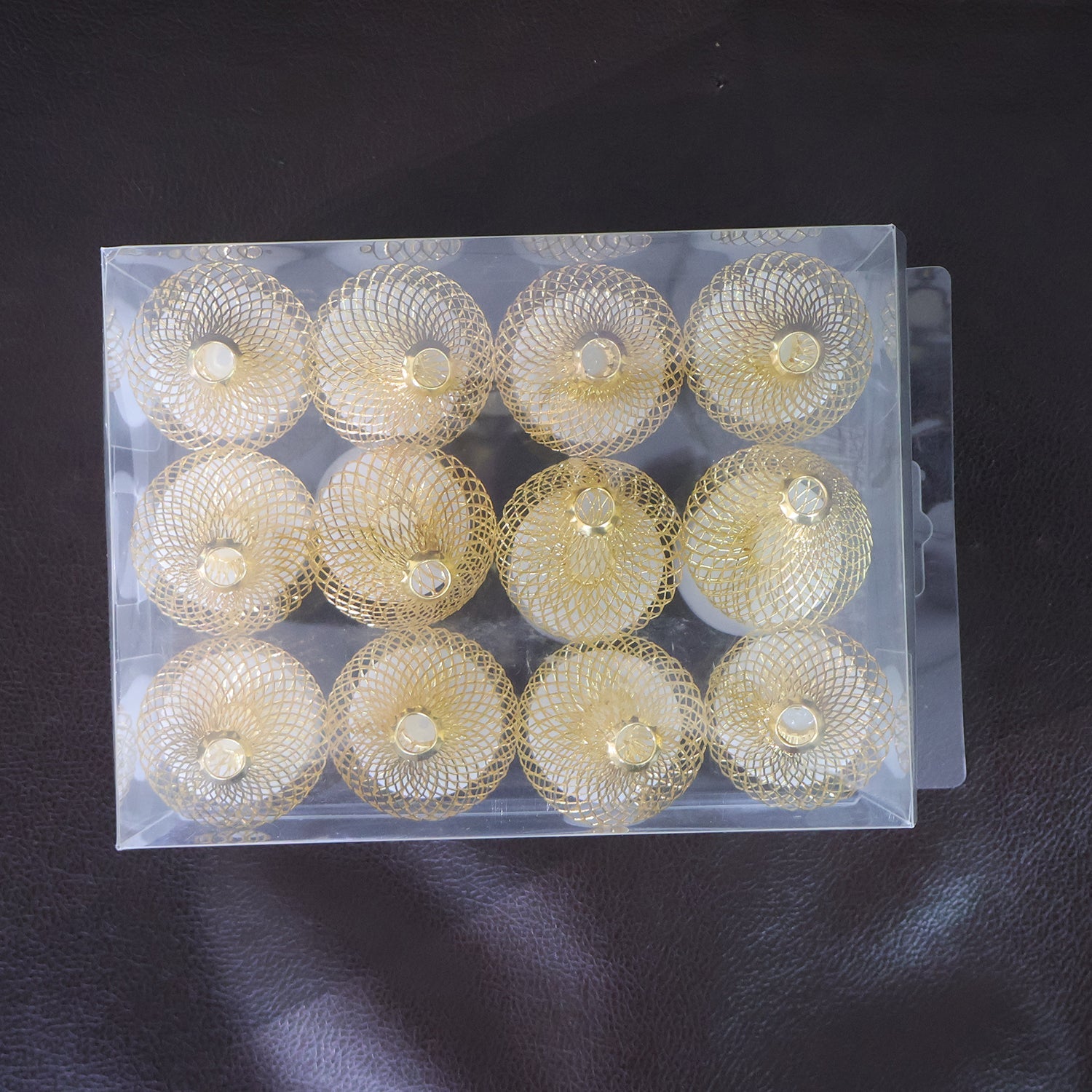 Set of 12 Decorative LED Flameless Candle Lights with Golden Net Cover Set of 12 Decorative LED Flameless Candle Lights with Golden Net Cover